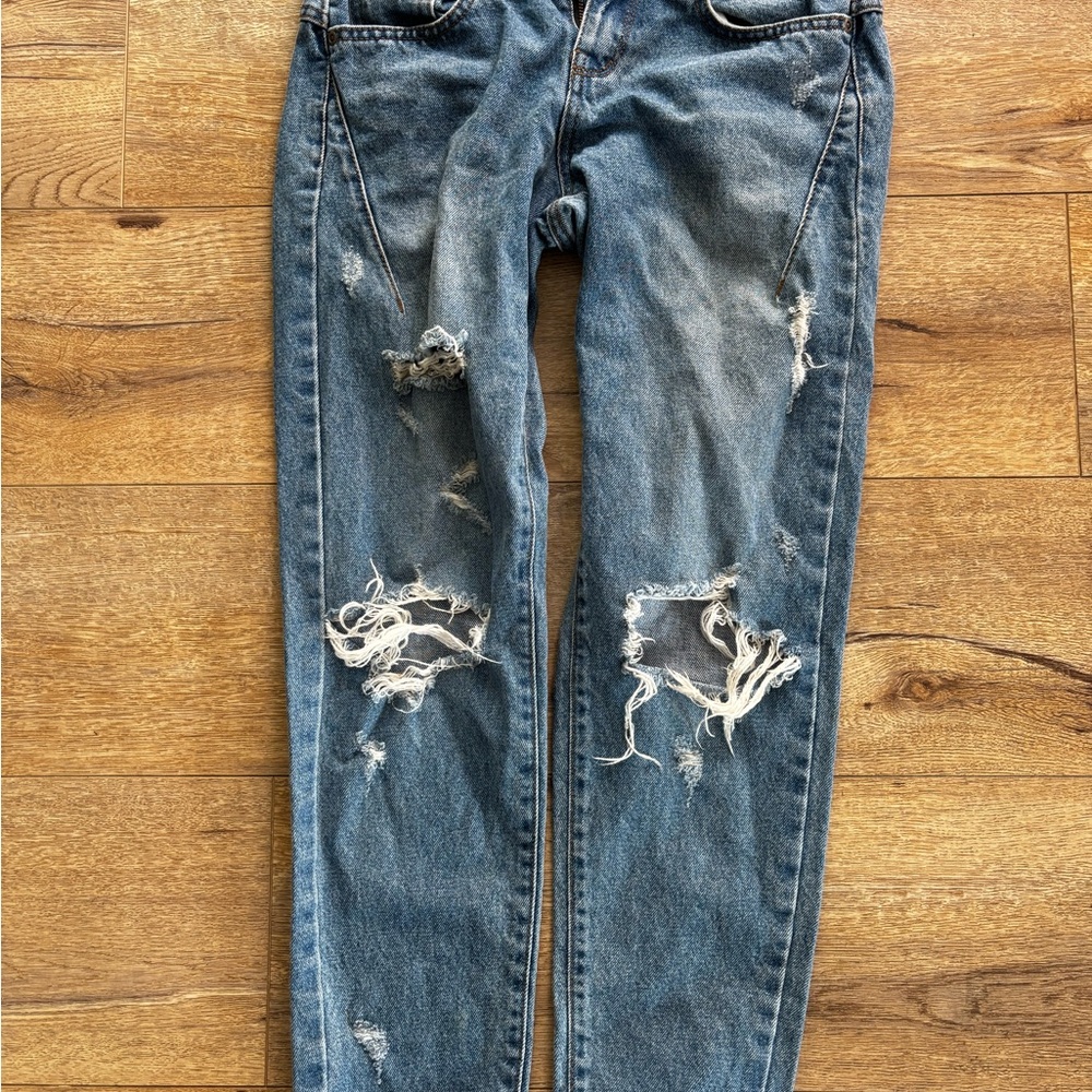 Distressed Blue Jeans
